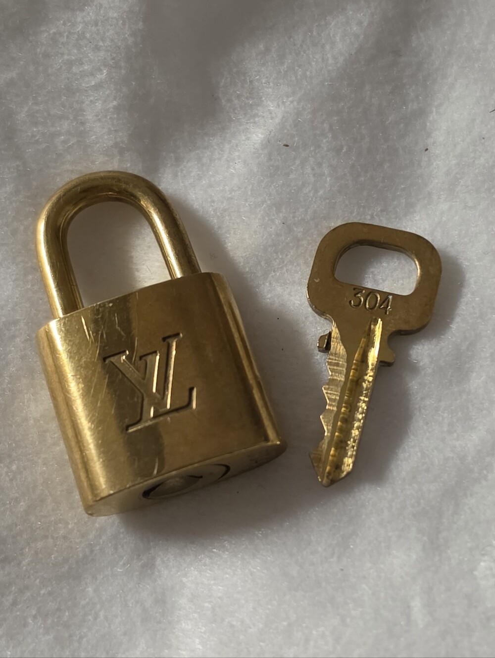 Louis Vuitton Gold-Tone Padlock and Key Set # 304